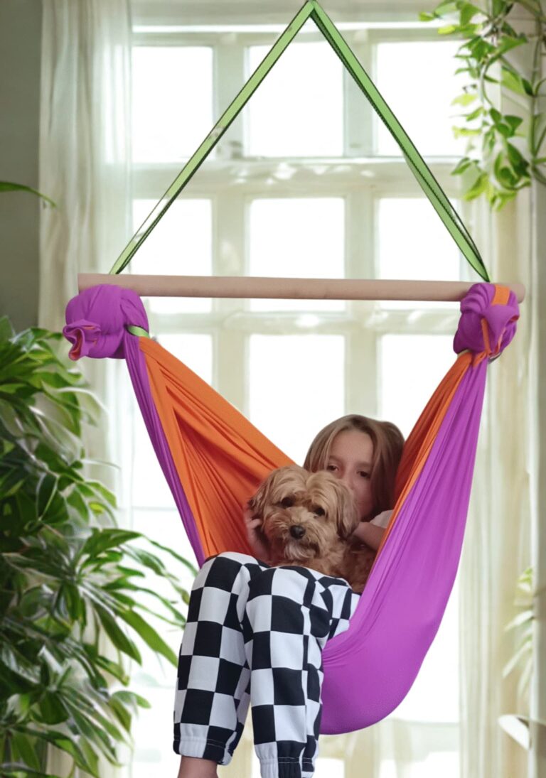 Proprioceptive sensory swing providing deep pressure input